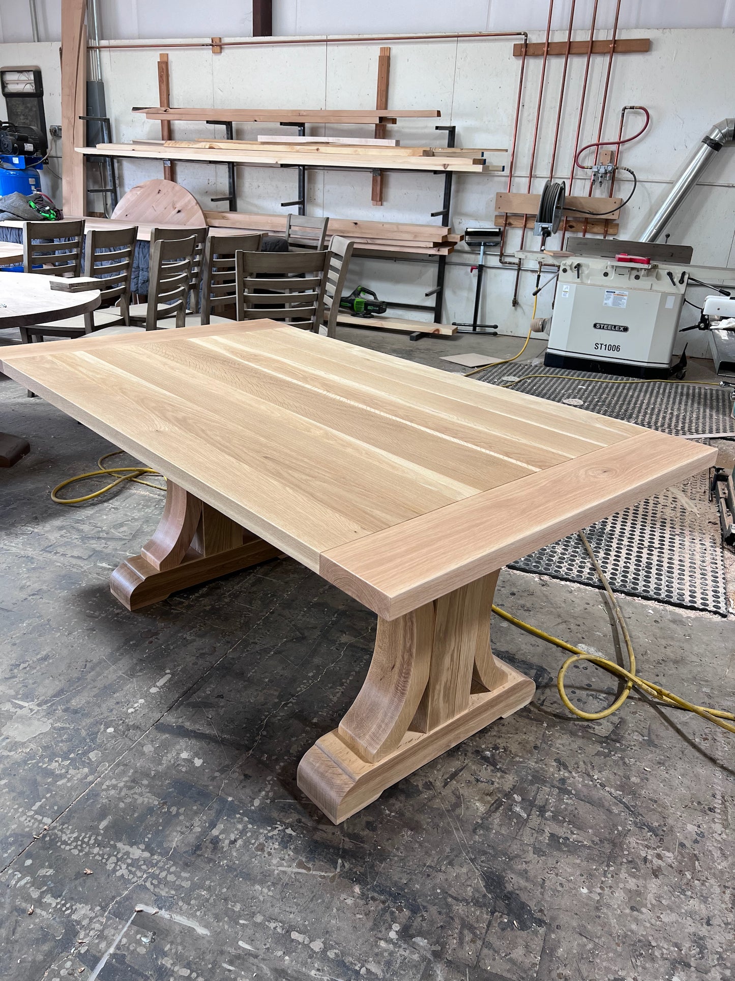 Wide Curved Base Dining Table