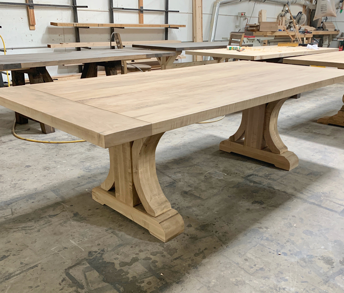 Wide Curved Base Dining Table