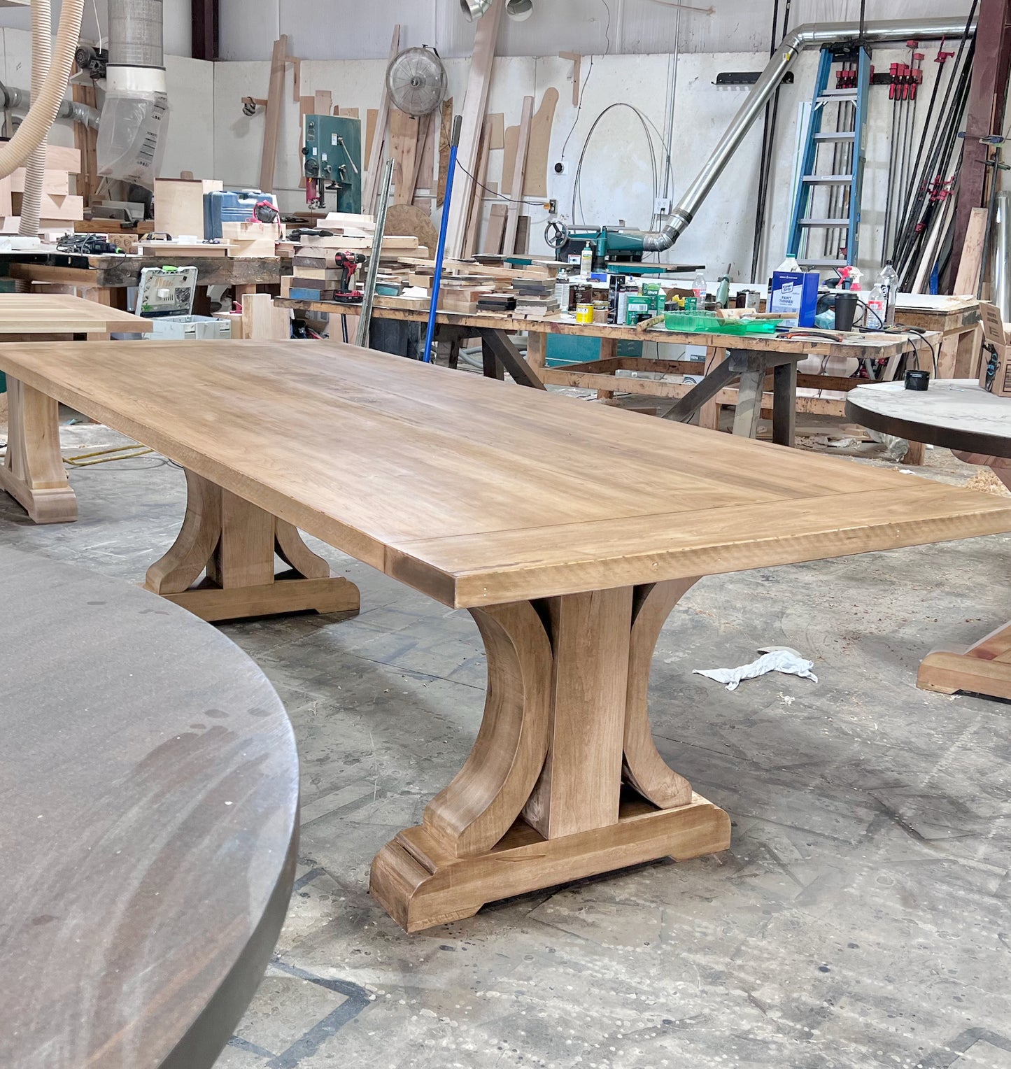 Wide Curved Base Dining Table